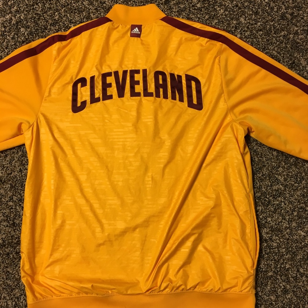 Cleveland Cavaliers official on court zip up